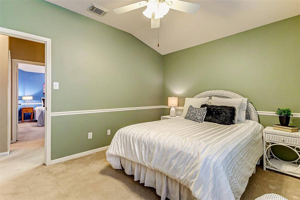 Another view of the secondary bedroom upstairs.