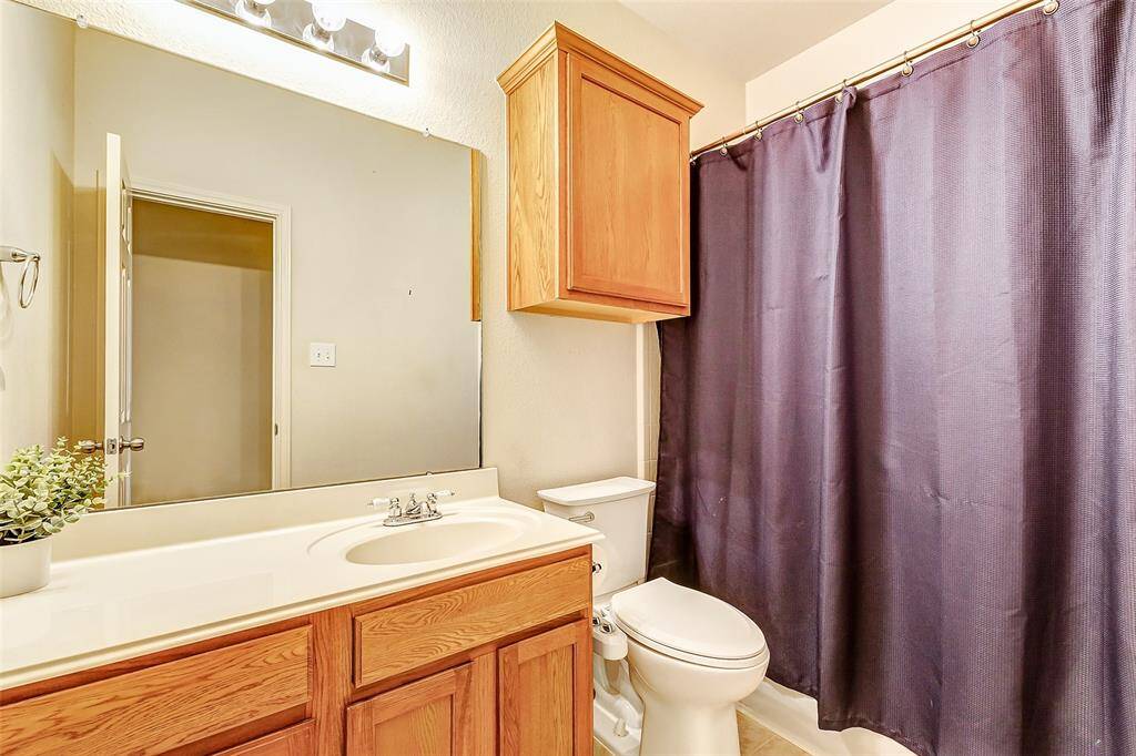 The secondary full bathroom upstairs.