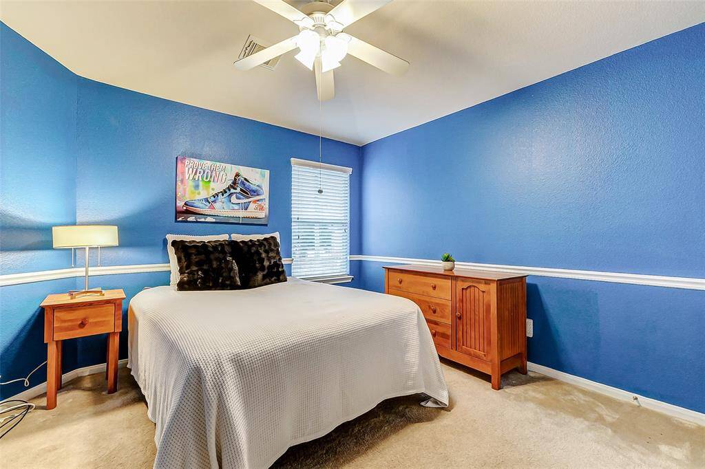 The third bedroom upstairs has room for all your furniture.