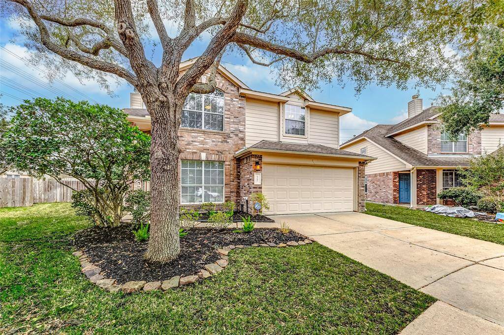 You will love the mature landscaping that frames the home.