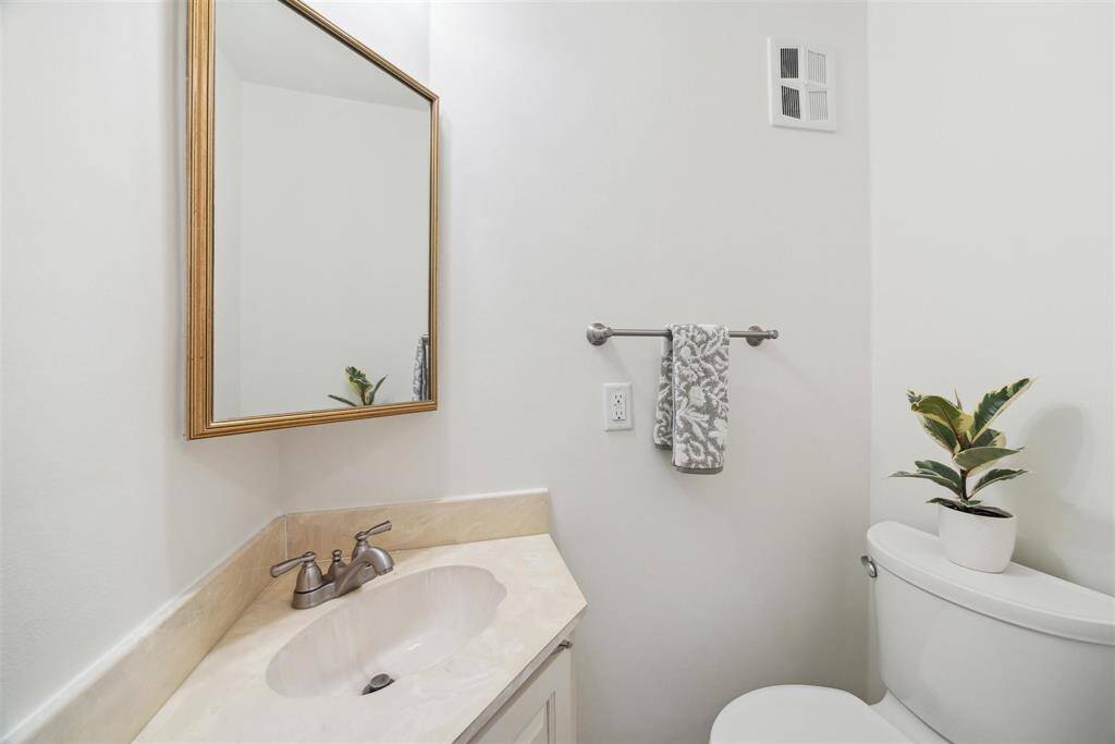 Half bathroom, located on the first floor, is perfect for guests.