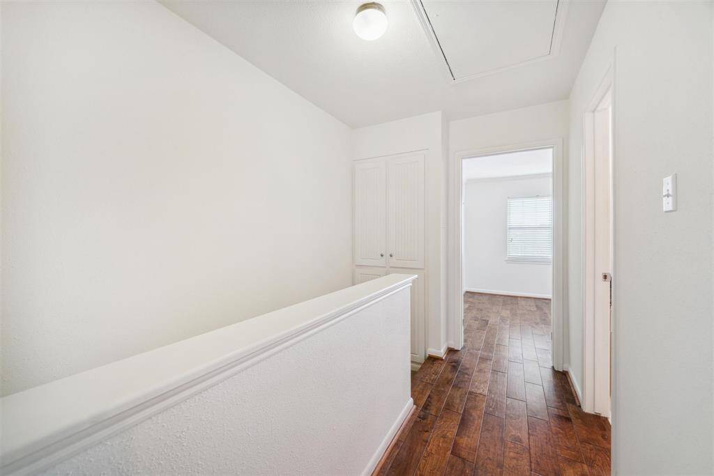 Both bedrooms are located upstairs with engineered hardwoods throughout.