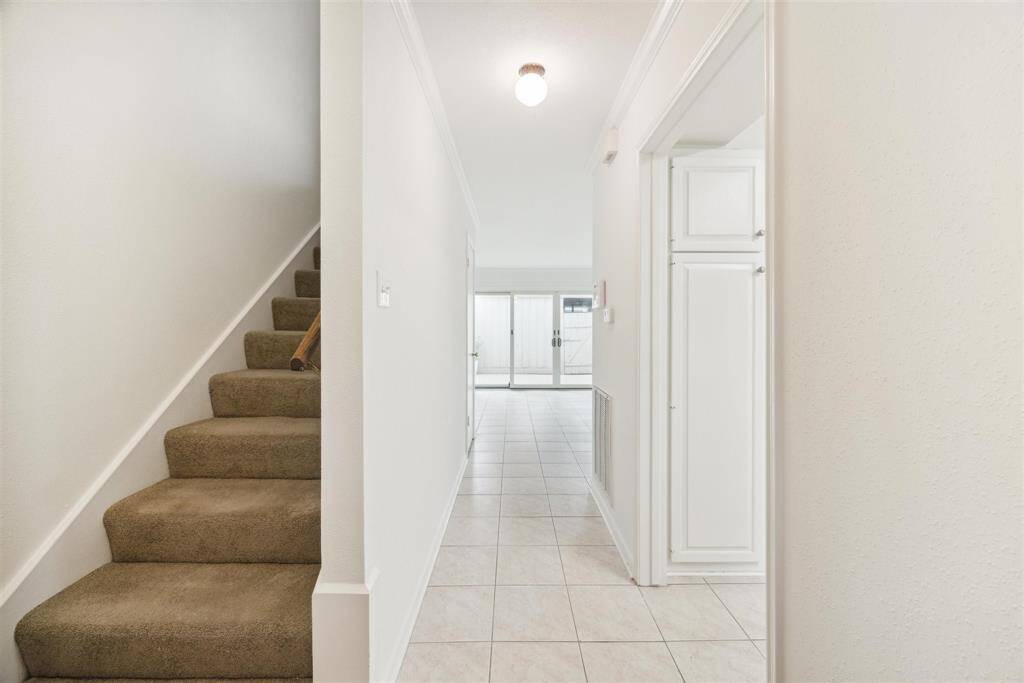 This two-story unit has been loved by its owner for more than 30 years!