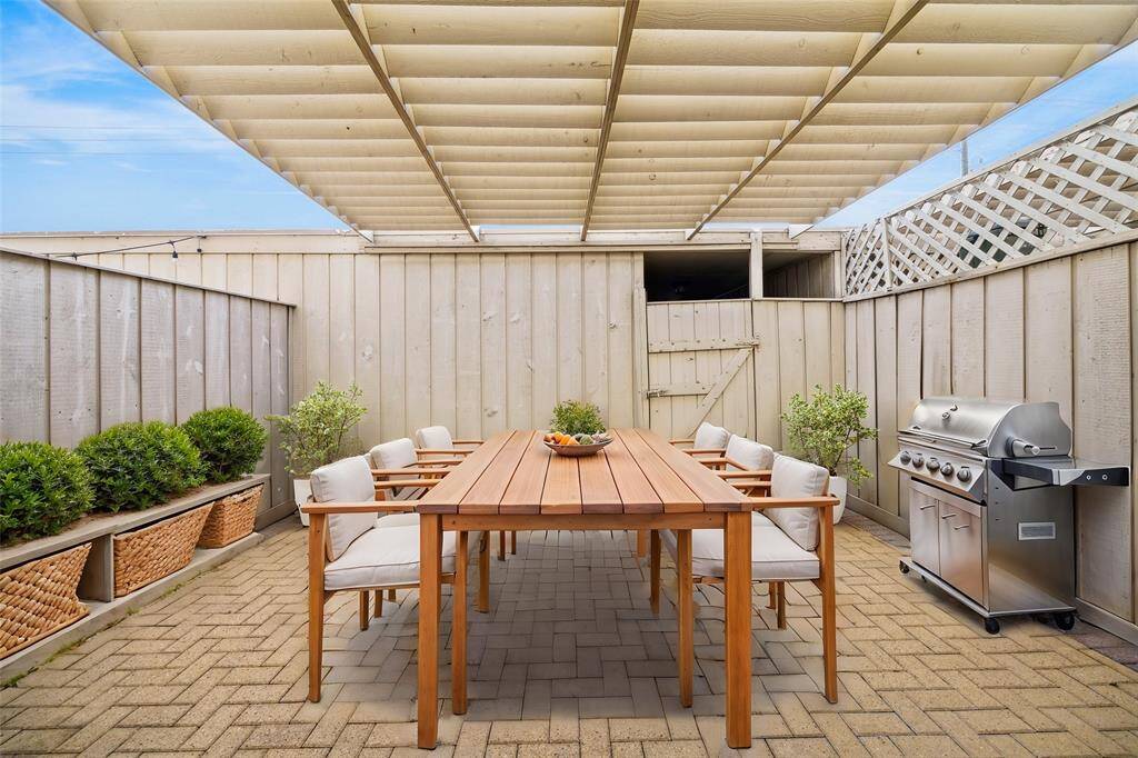 A private patio can become an extension of your indoor entertaining. *Virtually staged*