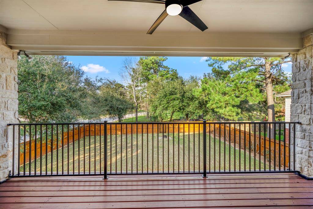 Stepping out onto the upstairs balcony, you’re greeted with a peaceful view of the backyard and surrounding green space. This private outdoor retreat is perfect for relaxing and enjoying the fresh air.