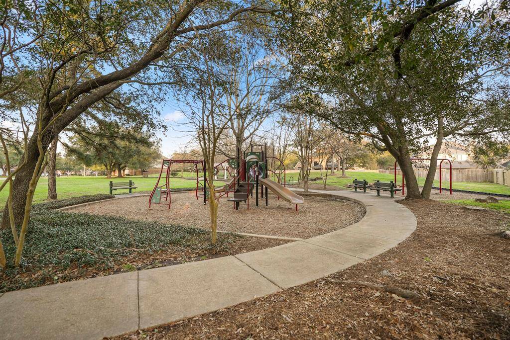 Located just behind the home, this is one of the many parks located throughout Windrose. There are pocket parks located throughout the community in each of the individual sections. All are offering the perfect shade you need. Walking trails are also located throughout the community.