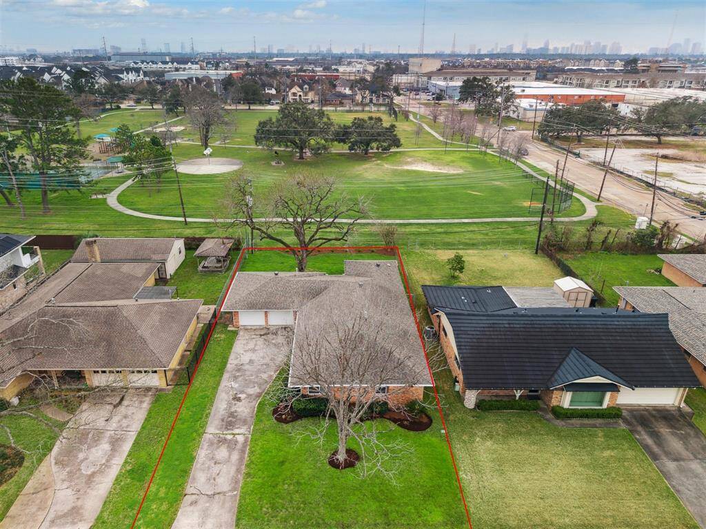 Park-side living awaits in this bright and airy midcentury three-bedroom, two-bathroom home featuring updated interiors, great storage and a large backyard abutting Jaycee Park.