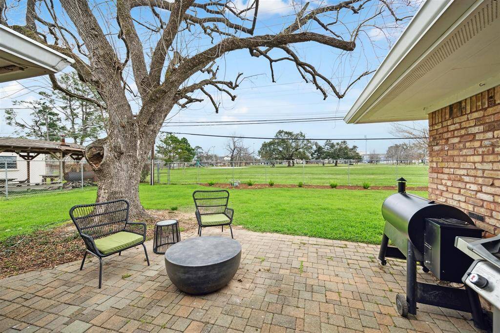 The neighboring park makes your backyard feel like it stretches on forever.