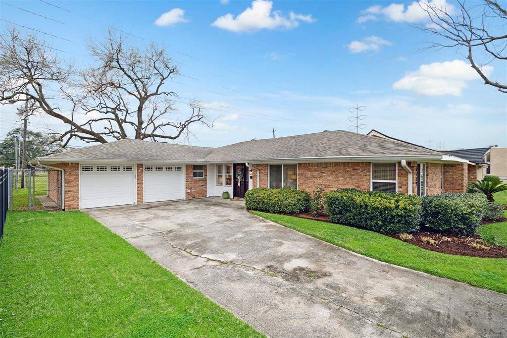 Enjoy plenty of off-street parking with a long, double-wide driveway and two-car attached garage.