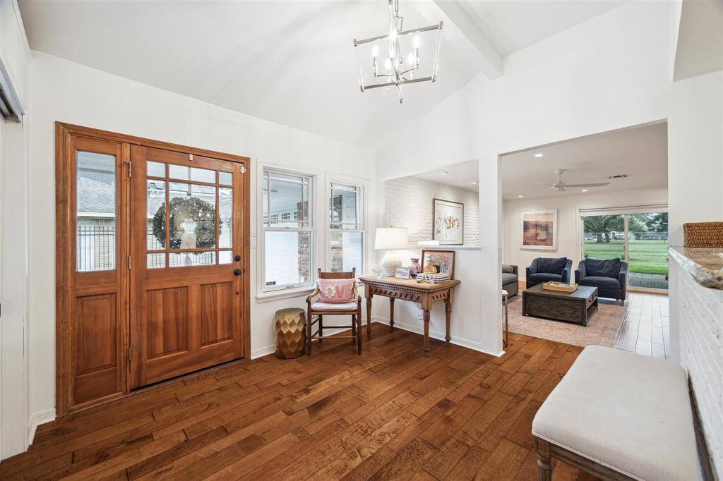 Renovated in 2013 and further updated over the last three years, this handsome home shines with tall ceilings dotted with new recessed LED lighting, hardwood and tile floors, and recently replaced PVC plumbing section recommended by Hydrostatic inspection in 2022.