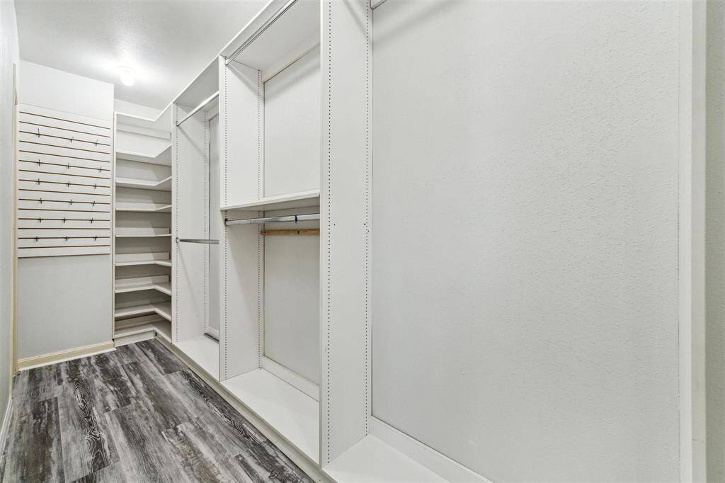 The primary bedroom closet is HUGE!