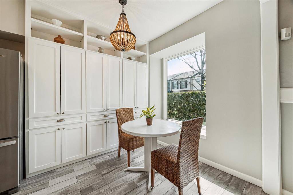 Just off the kitchen is a cozy breakfast area, ideal for enjoying your coffee by the window.