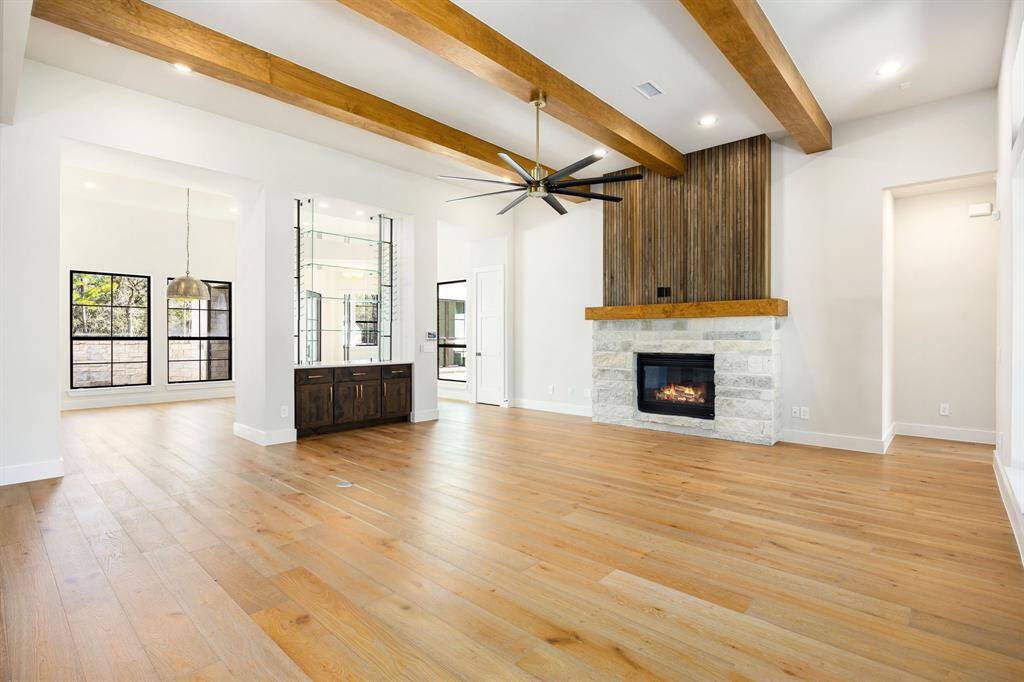 Living Room is open to the formal dining room, connected with a built-in wine rack