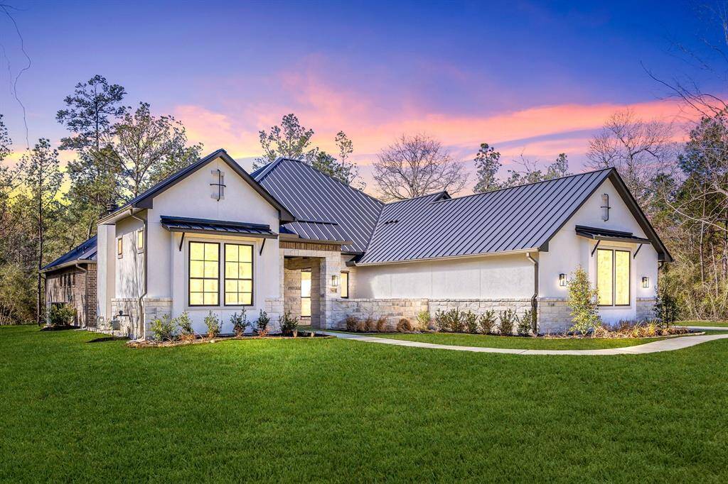 One-Story 3 Car Garage home nestled on 1.5 acres