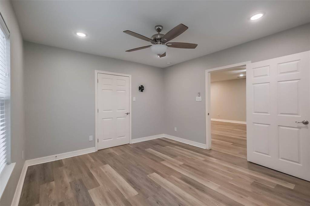 Bedroom with walk-in closet.