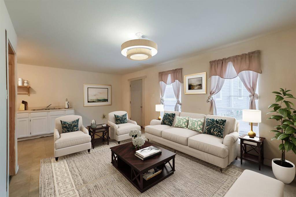 Garage apartment living room. Virtually staged.
