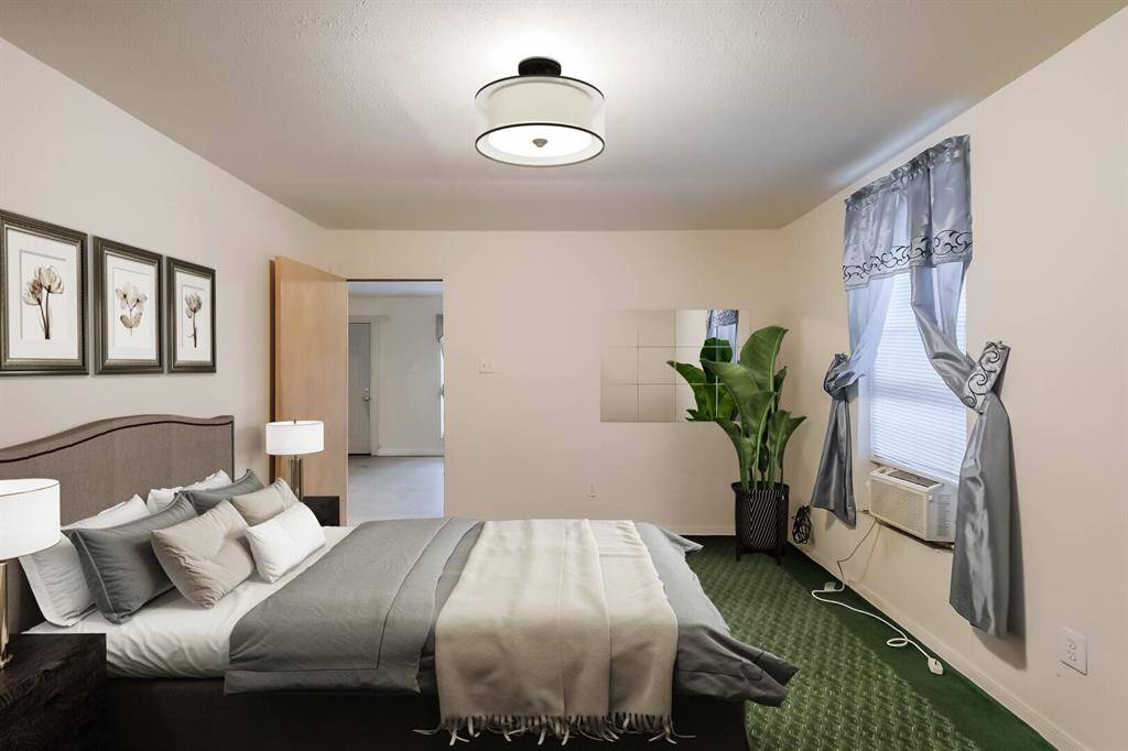 Garage apartment bedroom. Virtually staged.