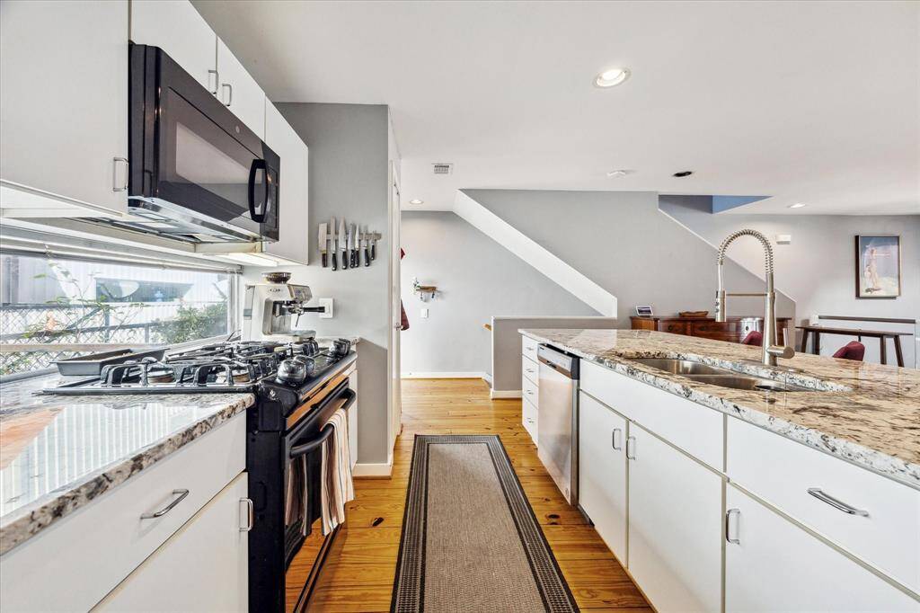 Alternate view of kitchen.