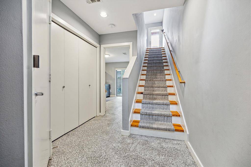 Entrance to the first floor bedroom to left of stairs.