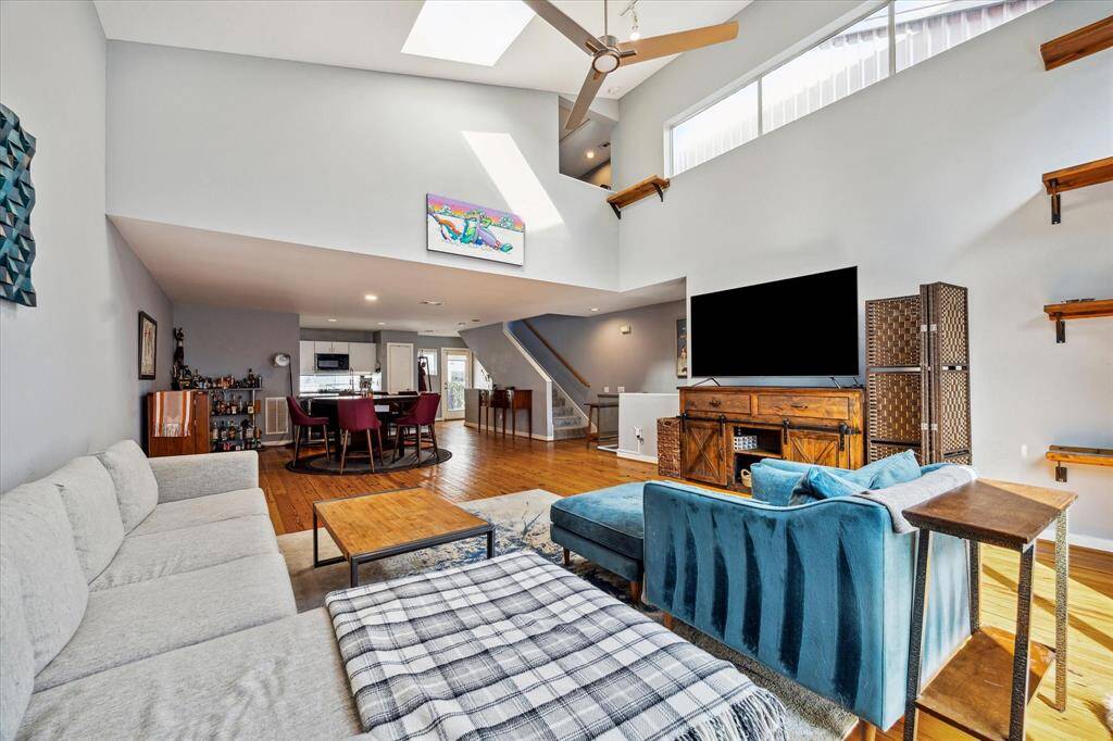 Alternate view of living, dining, and kitchen.