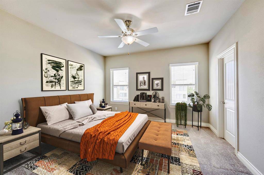 Top floor secondary bedroom with en suite bathroom. (virtually staged)