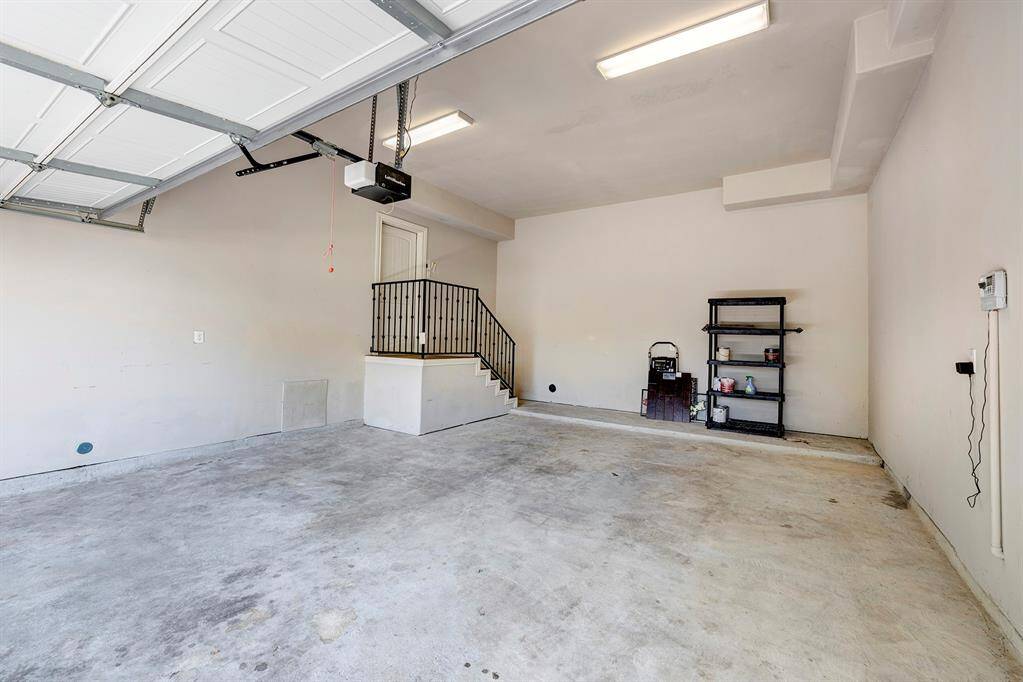 2 car attached garage with 12 foot ceiling provides possibilities for lots of storage space for all your needs.