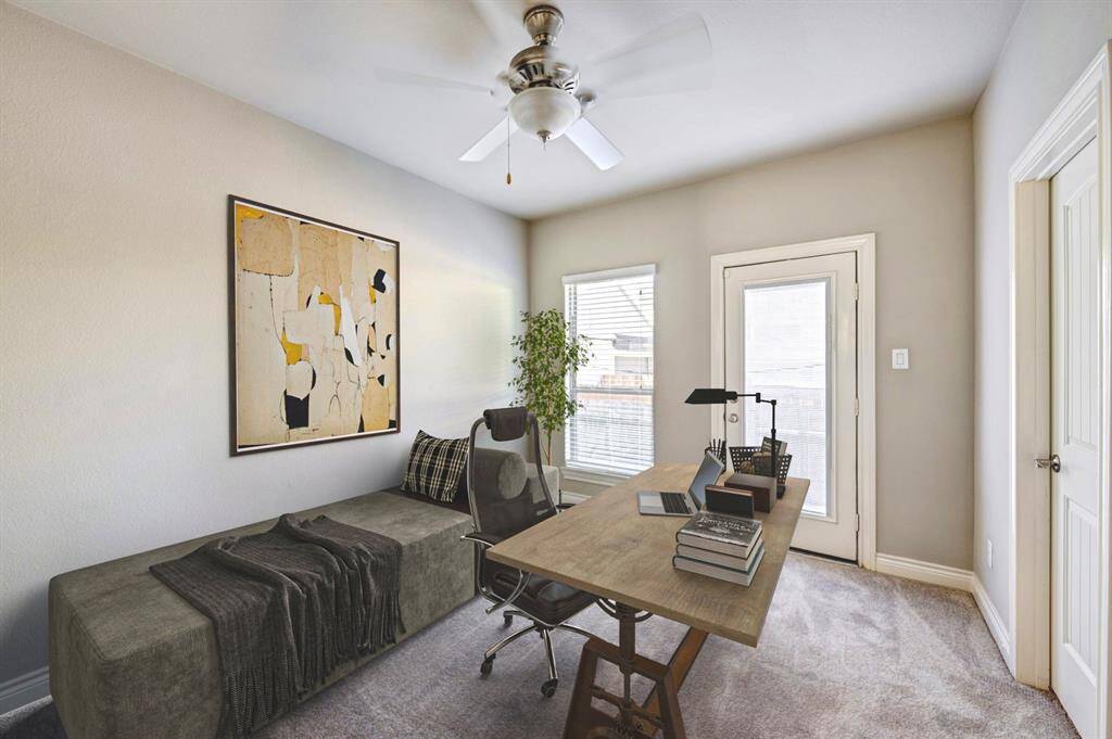 Downstairs bedroom with nice size closet, access to the back area for BBQ grilling and en suite bathroom. Perfect room as a guest bedroom/home office/studio, etc. (virtually staged)