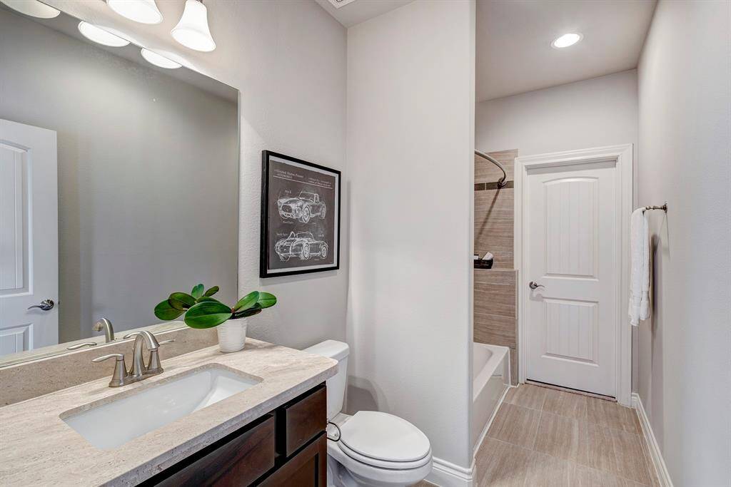 En suite bathroom for the downstairs bedroom with tub/shower.