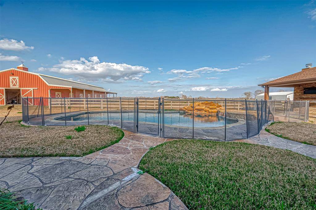 Luxury pool and spa with high quality materials and custom features.