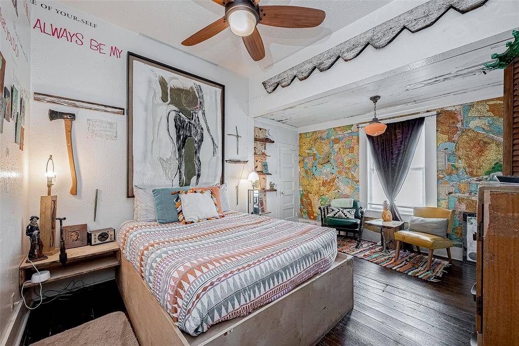 Bedroom has a custom built-in Queen bed frame + nightstands.