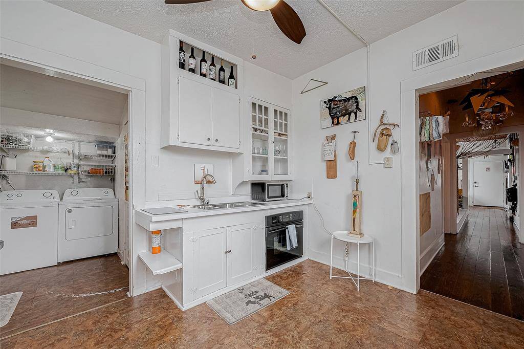 Cutest little kitchen with a convection oven, double eye- electric cook top & Ceiling fan light.