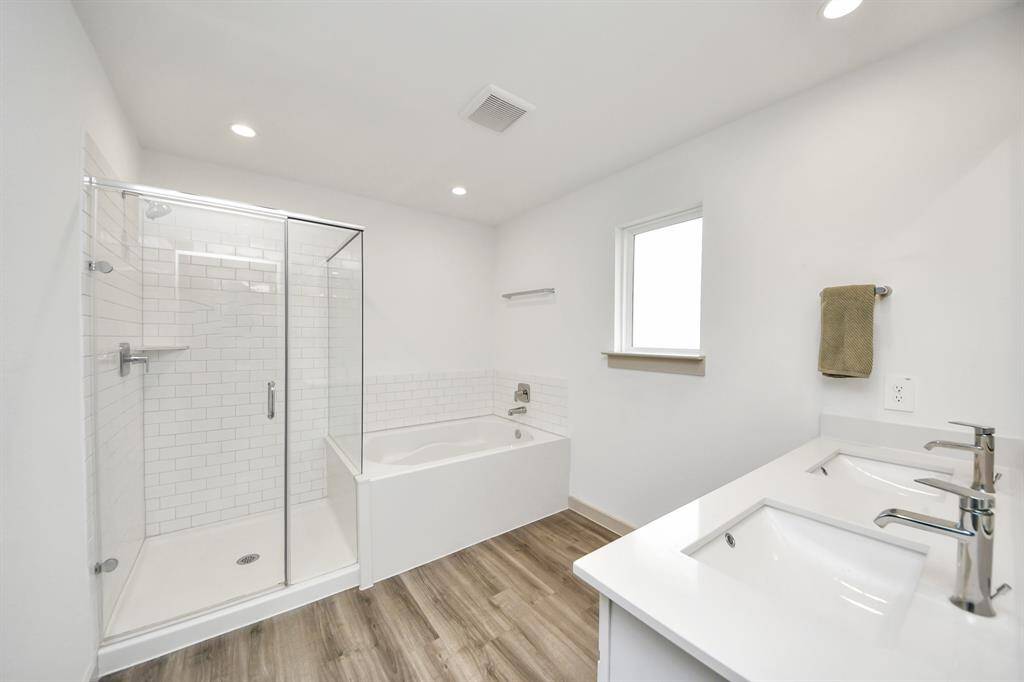 Ensuite bathroom with garden tub and separate shower