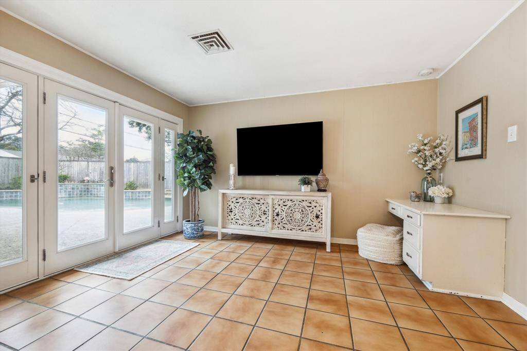 Den with French Doors overlooking Pool