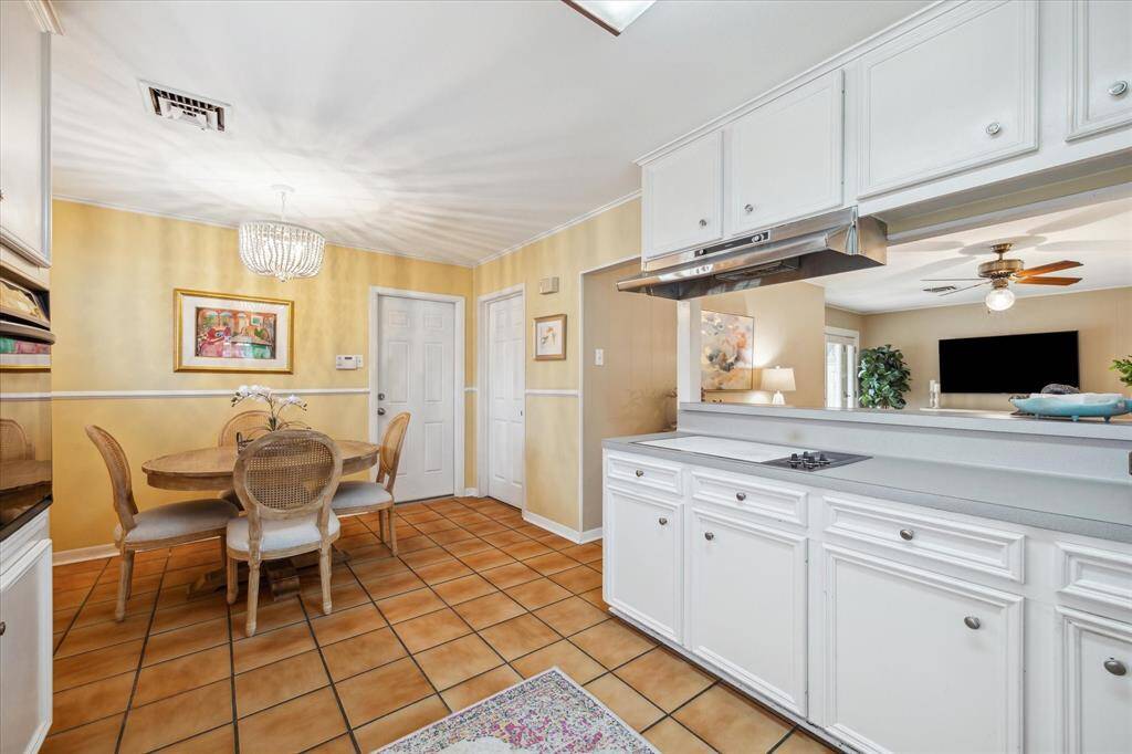 Kitchen with Breakfast Room overlooking into Den