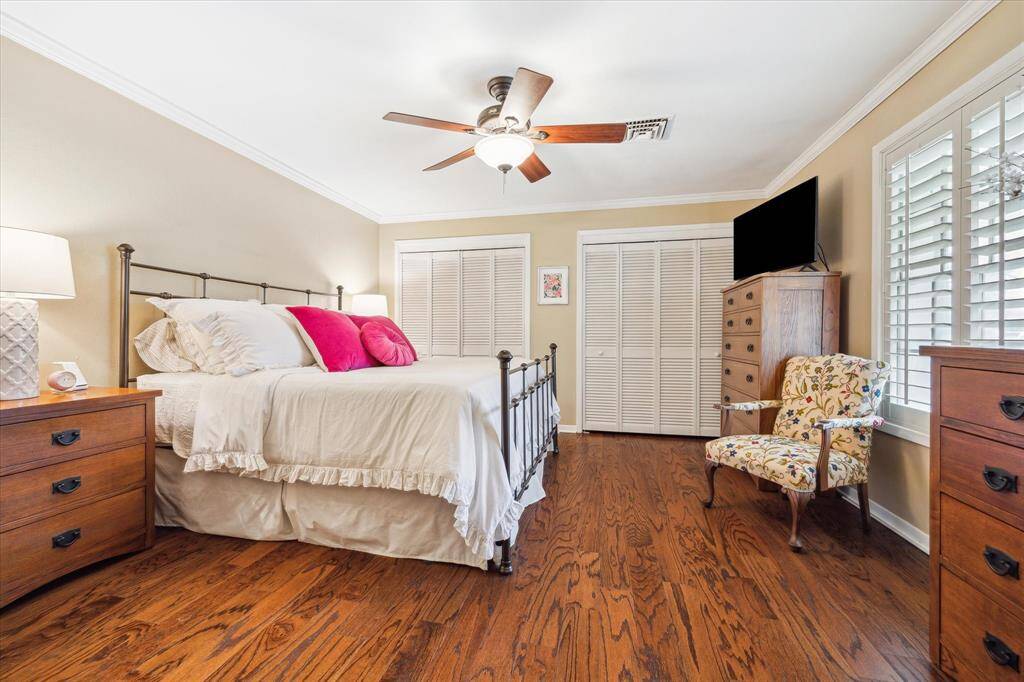 Primary Bedroom with Engineered Wood flooring & Plantation shutters