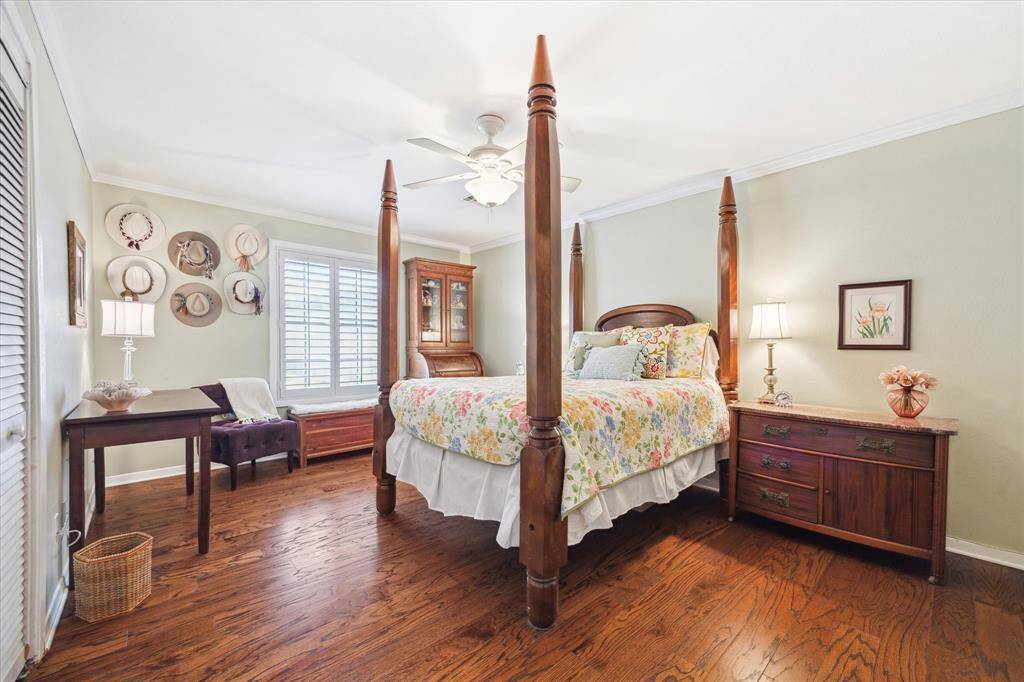Guest Bedroom with Engineered Wood flooring & Plantation shutters