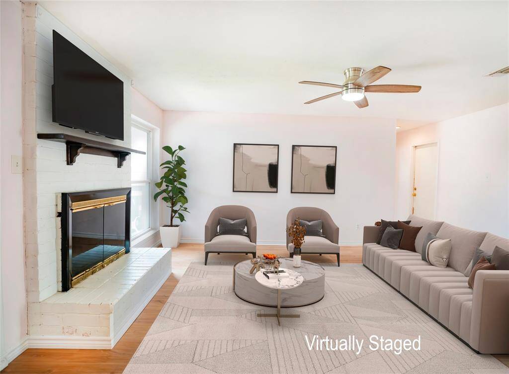 Living room virtually staged in a modern presentation.