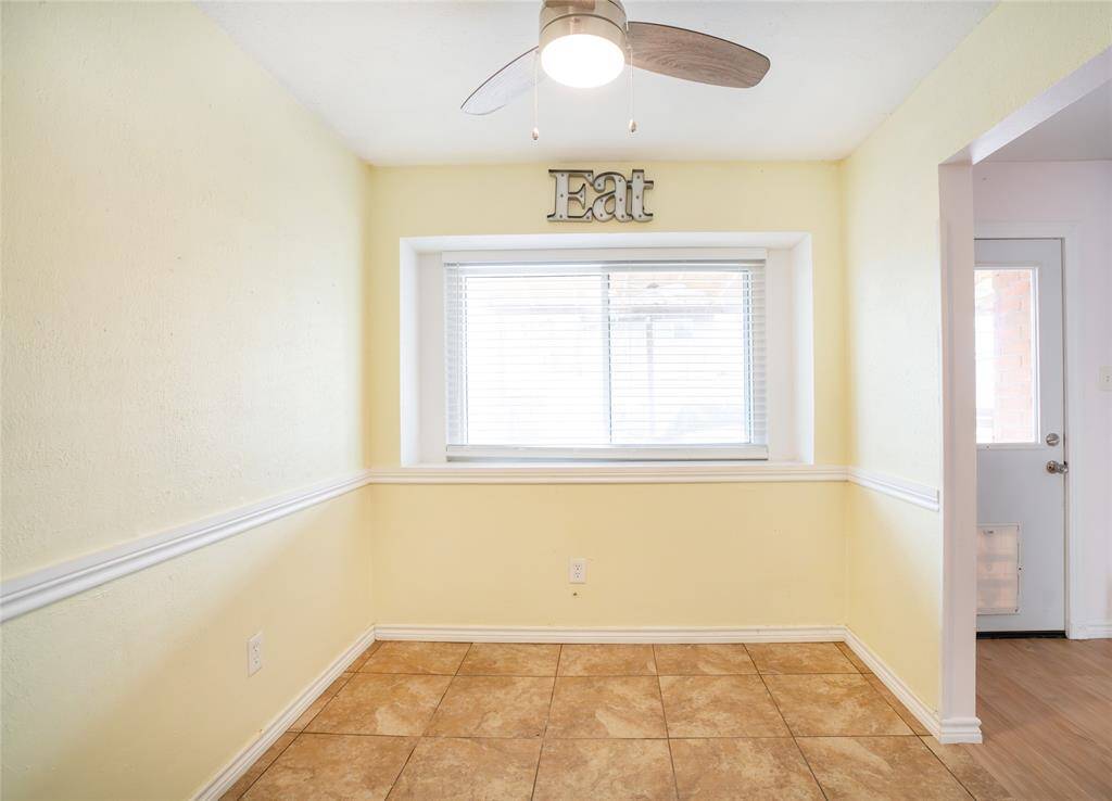 The dining space with recently updated windows.