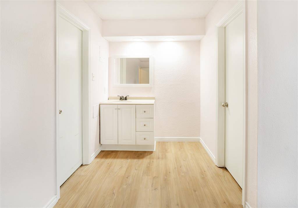 An extra vanity in the primary bedroom means everyone has plenty of room to get ready in the morning and wind down at night.