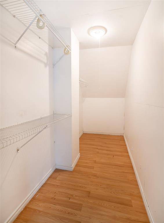 This closet is large enough to double as a storage space.