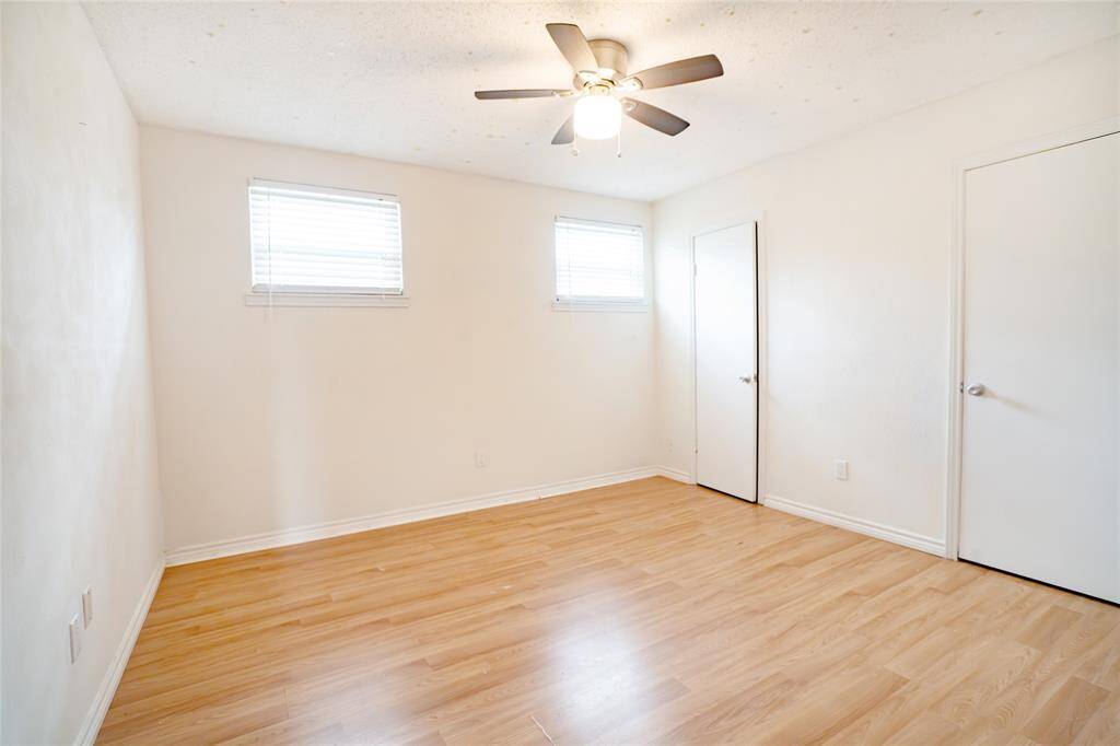 The second of four upstairs bedrooms.
