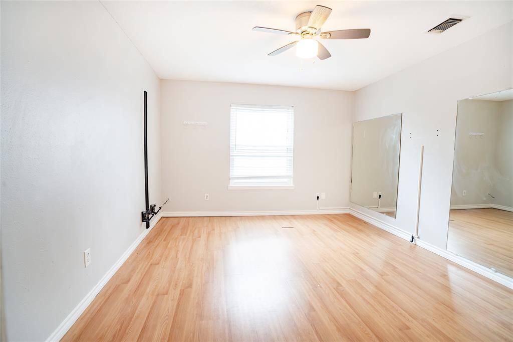 The fourth upstairs bedroom with attic access that could be built out to become even more living space.