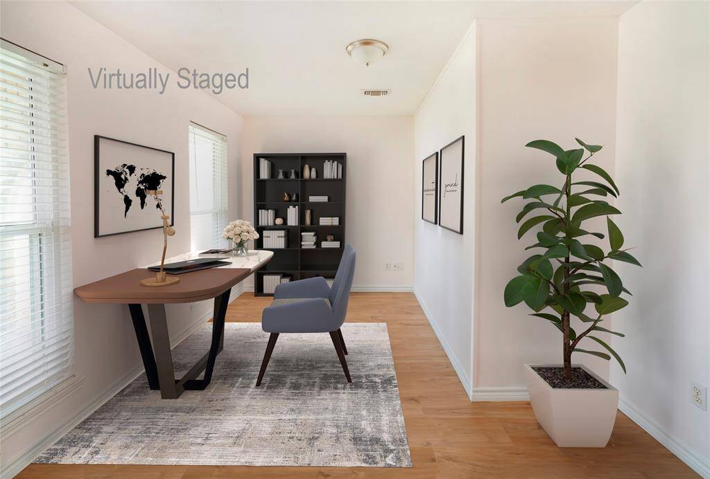 Flex space virtually staged as a home office.