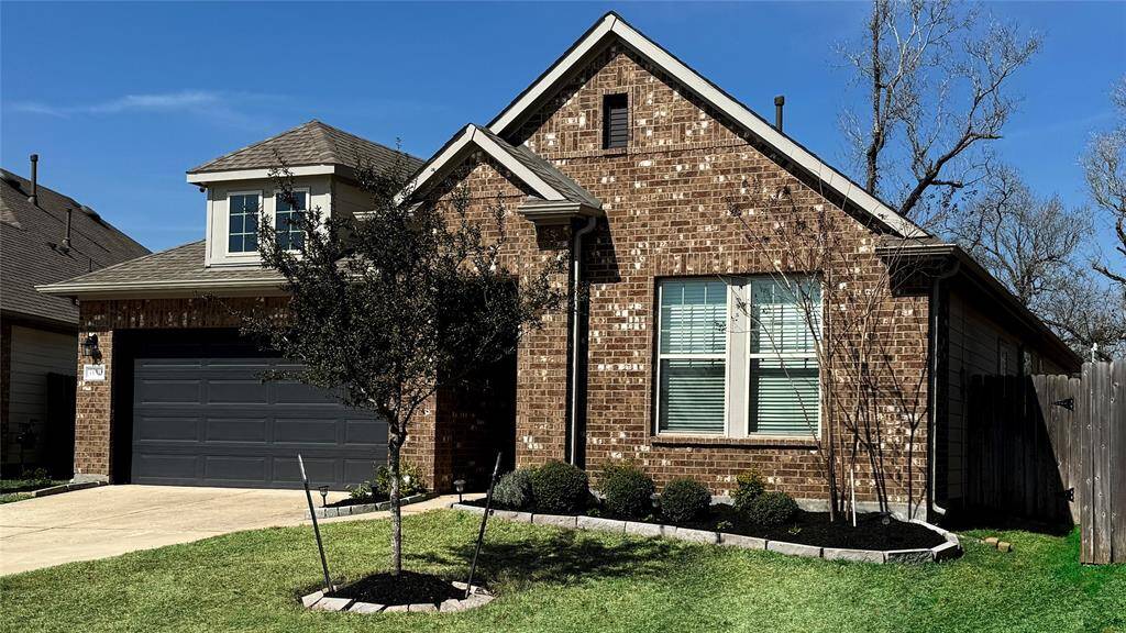 Classic architectural lines, framed by simple landscaping create excellent curb appeal.
