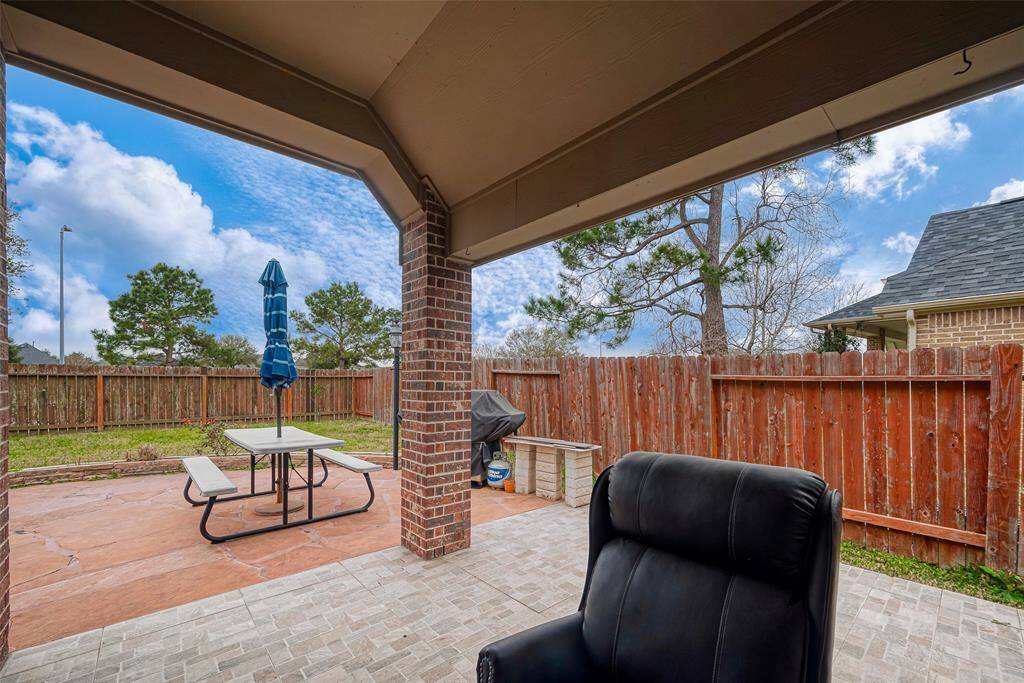 Enjoy the serenity of nature with the covered patio!