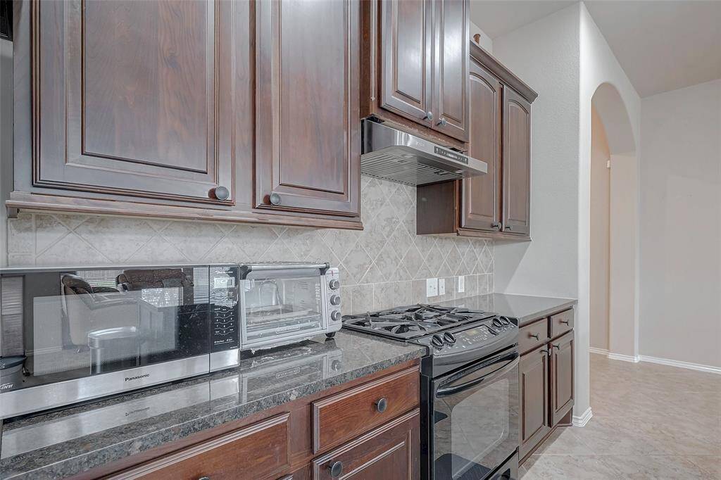 Microwave and air fryer are included.