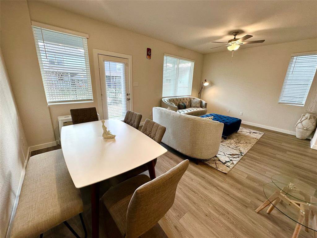 The back door you see will lead you to the covered patio and backyard space.