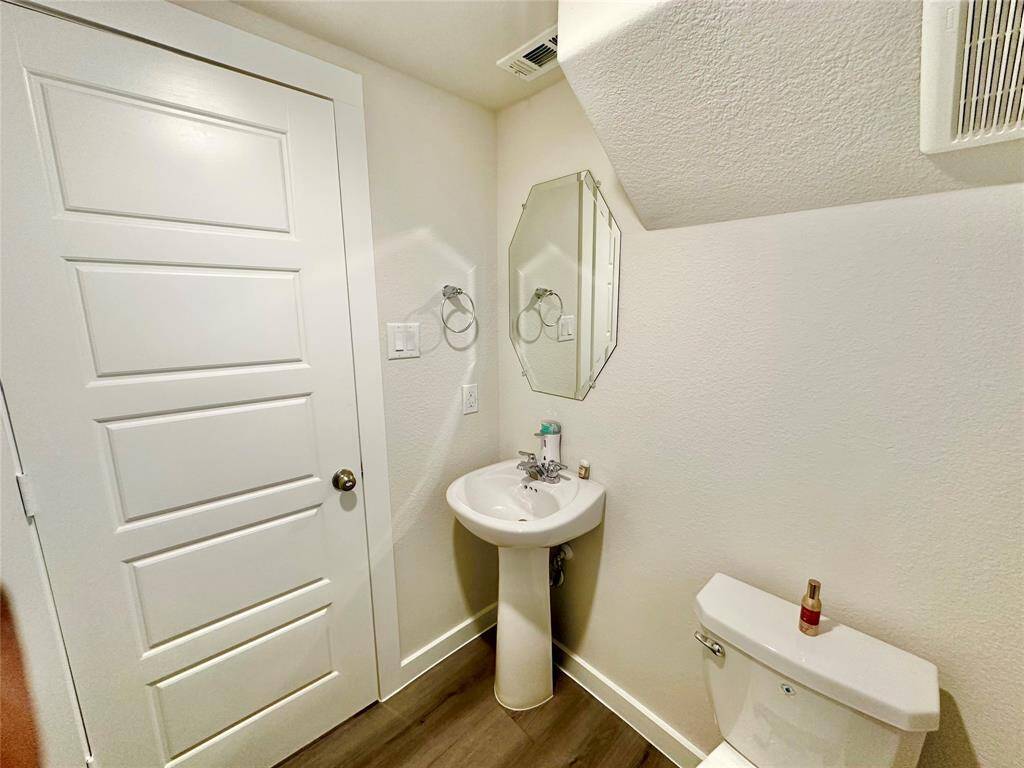 Half Bathroom on the first floor, very convenient for you, your family and guests
