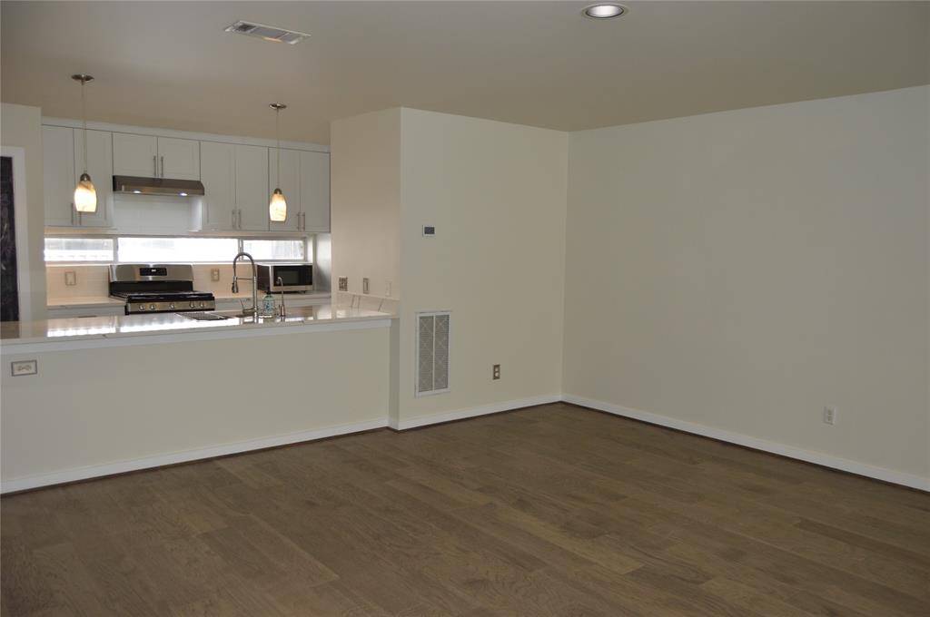 Large enough for a formal dining room set or to handle a pool table! Lots of space. One big open space, dining/living combination