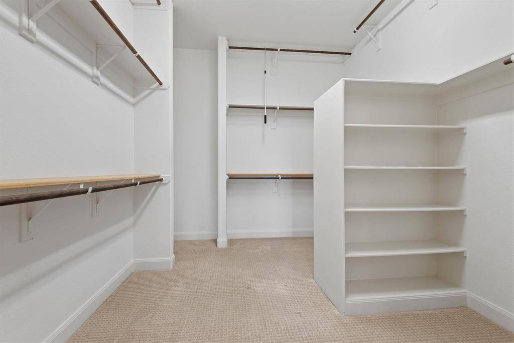 Huge walk-in closet in primary bedroom